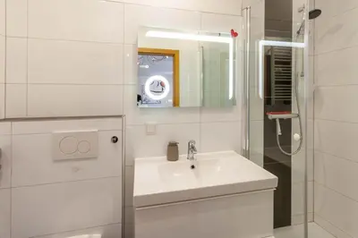 Ein Badezimmer in der Unterkunft Schützenchalet Wurmbergblick mit Sauna und Grill