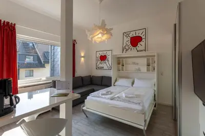 Ein Bett oder Betten in einem Zimmer der Unterkunft Schützenchalet Junior Suite mit Sauna und Grill