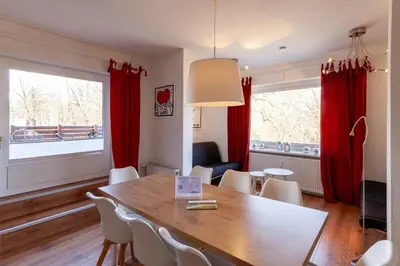Ein Sitzbereich in der Unterkunft Ferienwohnung Großes Schützenchalet mit 25 qm Dachterrasse