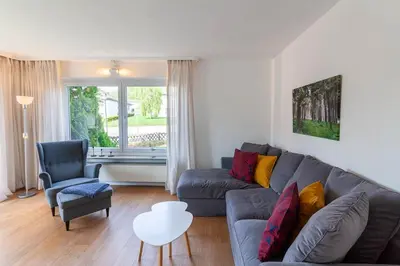 Ein Sitzbereich in der Unterkunft Ferienwohnung Auf dem Hügel mit Balkon
