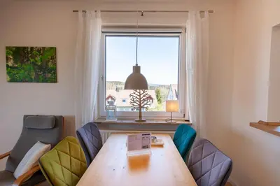 Ein Sitzbereich in der Unterkunft Ferienwohnung Köller mit Balkon