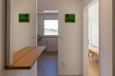 Ein Bett oder Betten in einem Zimmer der Unterkunft Ferienwohnung Köller mit Balkon