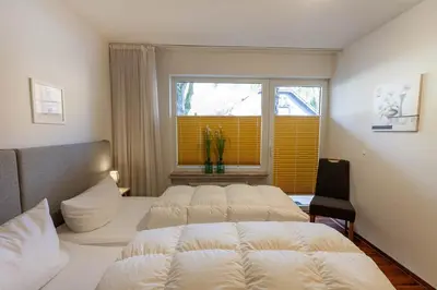 Ein Bett oder Betten in einem Zimmer der Unterkunft Ferienwohnung Bergrast mit Balkon