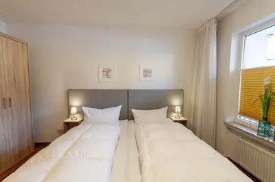 Ein Bett oder Betten in einem Zimmer der Unterkunft Ferienwohnung Bergrast mit Balkon