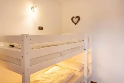 Ein Bett oder Betten in einem Zimmer der Unterkunft Ferienwohnung Kruse
