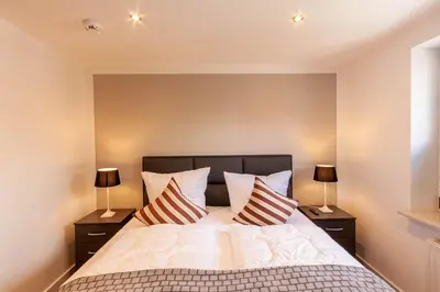 Ein Bett oder Betten in einem Zimmer der Unterkunft Ferienwohnung Kleines Bergchalet