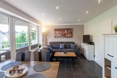 Ein Sitzbereich in der Unterkunft Ferienwohnung Kleines Bergchalet