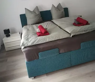 Ein Bett oder Betten in einem Zimmer der Unterkunft Im Harzer Vogelnest Spatzennest