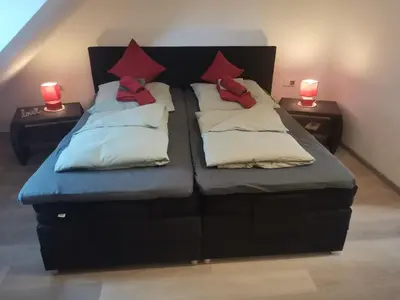 Ein Bett oder Betten in einem Zimmer der Unterkunft Im Harzer Vogelnest Finkennest