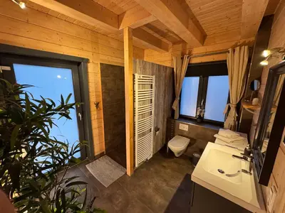 Ein Sitzbereich in der Unterkunft Harz-Blockhaus, 4 und 5 Sterne, Sauna - und Kamin - KH