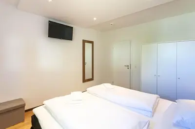 Ein Bett oder Betten in einem Zimmer der Unterkunft Ferienwohnung Bergsicht mit Balkon