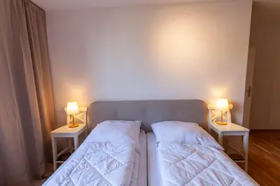 Ein Bett oder Betten in einem Zimmer der Unterkunft Ferienwohnung Bergwiesenblick mit Balkon