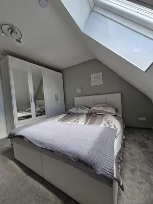 Ein Bett oder Betten in einem Zimmer der Unterkunft Ferienhaus Alpakahof Goslar