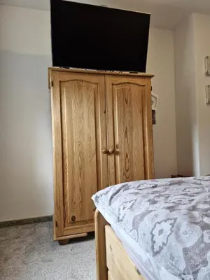 Ein Bett oder Betten in einem Zimmer der Unterkunft Ferienhaus Alpakahof Goslar
