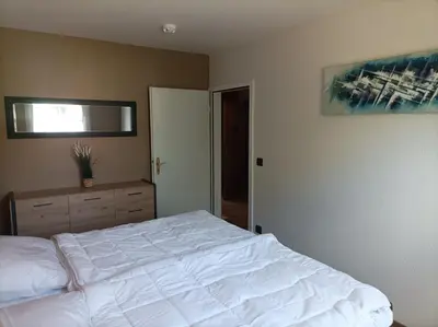 Ein Bett oder Betten in einem Zimmer der Unterkunft Blankenburgerstr 8b FeWo Batian am Waldesrand