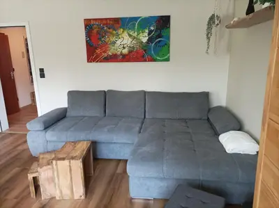 Ein Sitzbereich in der Unterkunft Blankenburgerstr 8b FeWo Batian am Waldesrand