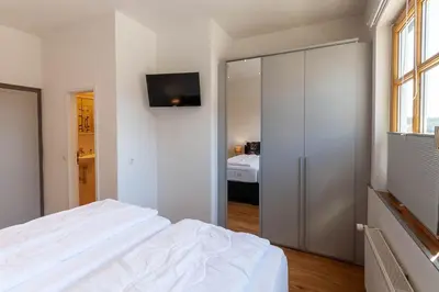 Ein Bett oder Betten in einem Zimmer der Unterkunft Ferienwohnung Waldfrieden 1 mit Garten und Grill