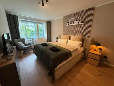 Ein Bett oder Betten in einem Zimmer der Unterkunft Ferienwohnung Babajaga in Bad Harzburg, Moderne Unterkunft für Pärchen in Top Lage