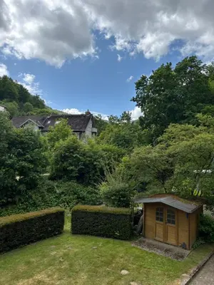 Ein Garten an der Unterkunft Ferienwohnung Babajaga in Bad Harzburg, Moderne Unterkunft für Pärchen in Top Lage