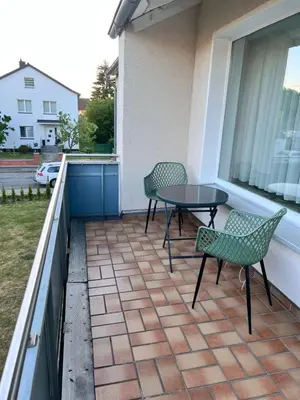 Ein Balkon oder eine Terrasse in der Unterkunft FeWo Aue