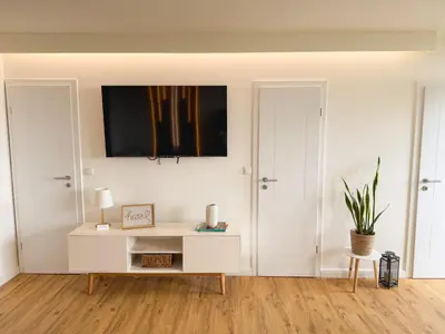 TV/Unterhaltungsangebot in der Unterkunft Apartment Rehberg 14 OG Panorama Balkon Pool Sauna