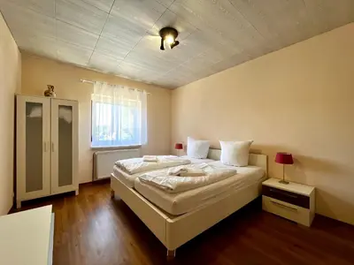 Ein Bett oder Betten in einem Zimmer der Unterkunft Ferienhaus Harzseele