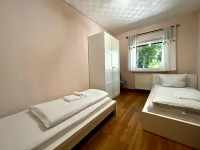 Ein Bett oder Betten in einem Zimmer der Unterkunft Ferienhaus Harzseele