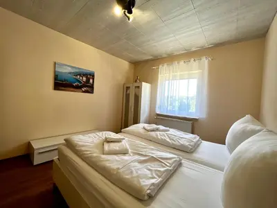 Ein Bett oder Betten in einem Zimmer der Unterkunft Ferienhaus Harzseele