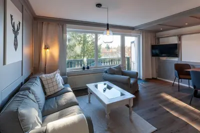 Ein Sitzbereich in der Unterkunft Ferienwohnung Harzer Hütte mit Balkon