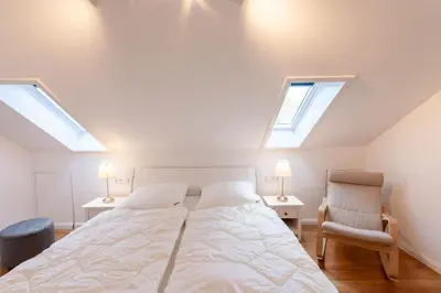 Ein Bett oder Betten in einem Zimmer der Unterkunft Ferienwohnung Blickfang mit Balkon und Traumblick
