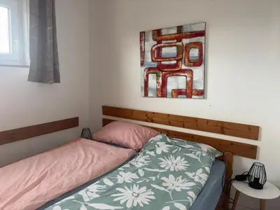 Ein Bett oder Betten in einem Zimmer der Unterkunft Apartment 519