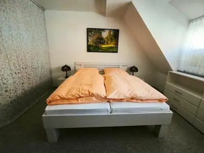 Ein Bett oder Betten in einem Zimmer der Unterkunft Die Brockenstube