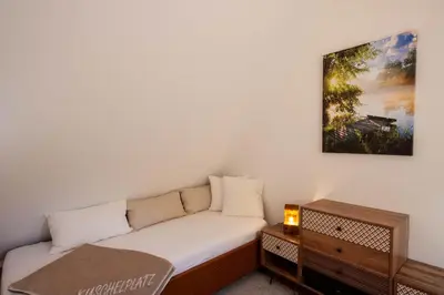 Ein Bett oder Betten in einem Zimmer der Unterkunft Ferienwohnung Hexenloft