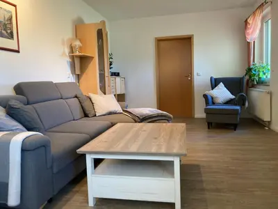 Ein Sitzbereich in der Unterkunft Ferienwohnung Huyblick