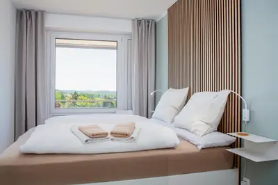 Ein Bett oder Betten in einem Zimmer der Unterkunft Bergmannsblick 2