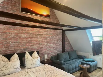 Ein Sitzbereich in der Unterkunft Ferienwohnung Glück Auf