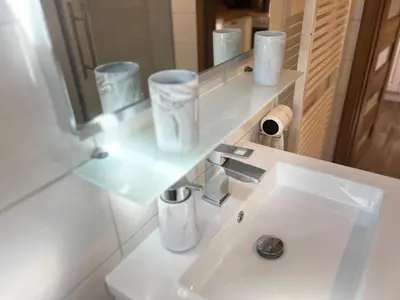 Ein Badezimmer in der Unterkunft Ferienwohnung Glück Auf