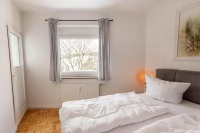 Ein Bett oder Betten in einem Zimmer der Unterkunft Ferienwohnung Bergverliebt mit Balkon und Traumblick
