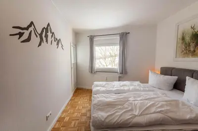 Ein Bett oder Betten in einem Zimmer der Unterkunft Ferienwohnung Bergverliebt mit Balkon und Traumblick