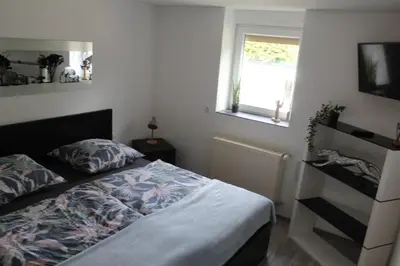 Ein Bett oder Betten in einem Zimmer der Unterkunft Schroedters Fewo
