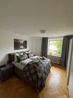 Ein Bett oder Betten in einem Zimmer der Unterkunft Kontinental B