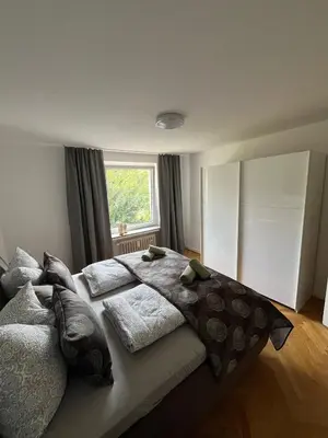 Ein Bett oder Betten in einem Zimmer der Unterkunft Kontinental B