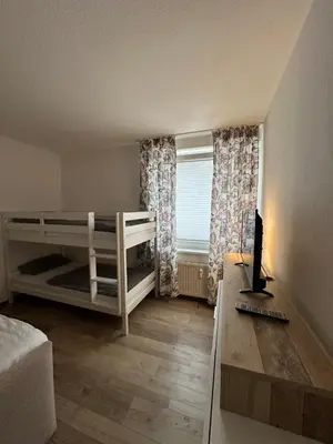 Ein Bett oder Betten in einem Zimmer der Unterkunft HarzZeit Braunlage
