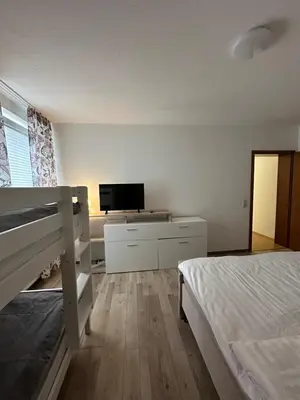 Ein Bett oder Betten in einem Zimmer der Unterkunft HarzZeit Braunlage