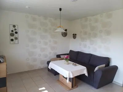 Ein Sitzbereich in der Unterkunft Haus Nietmann Kleine gemütliche Ferienwohnung mit modernen Akzenten