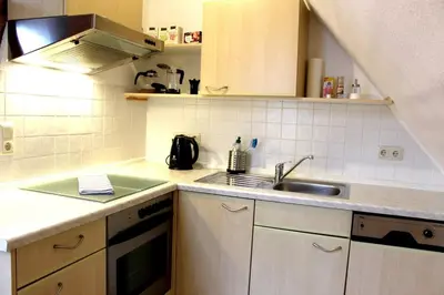 Küche/Küchenzeile in der Unterkunft WaldFried - zentral gelegen, Kamin, WLAN, TV