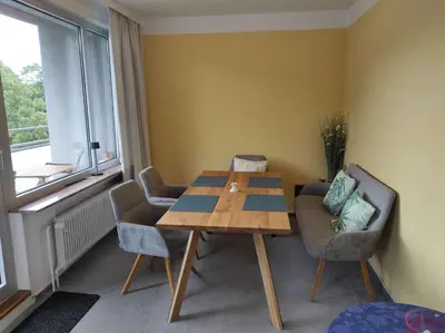 Ein Sitzbereich in der Unterkunft Ferienwohnung Penthouse Bummelallee