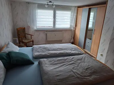 Ein Bett oder Betten in einem Zimmer der Unterkunft Ferienwohnung am Kloster Drübeck