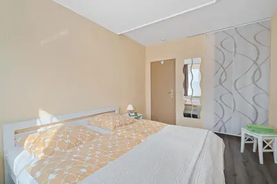 Ein Bett oder Betten in einem Zimmer der Unterkunft FarbSpiel
