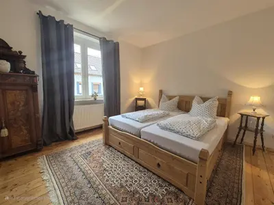 Ein Bett oder Betten in einem Zimmer der Unterkunft Ferienhaus Bärbel